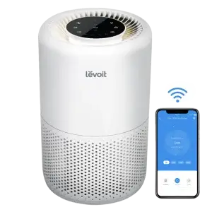 Levoit Core 200S Smart Air Purifier in white, showing control panel and smartphone app, with a modern design.