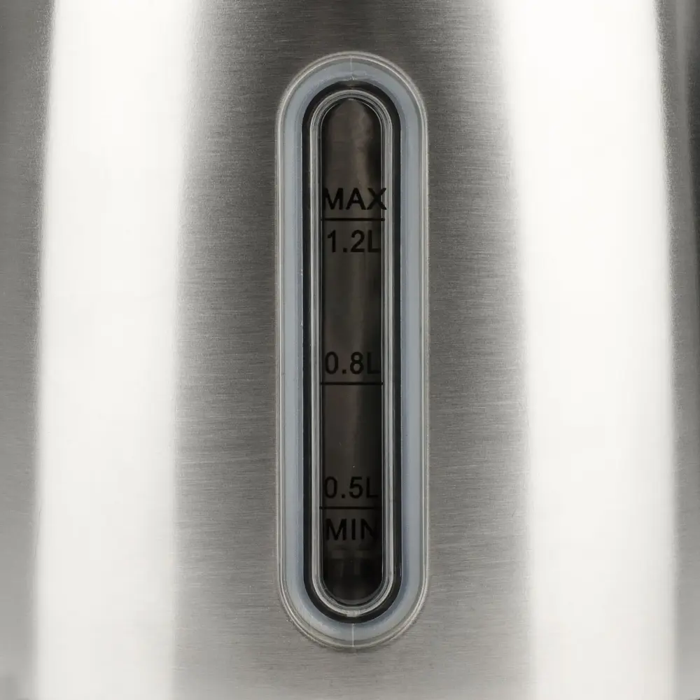 Close-up of the G3 Ferrari Idra G10095 stainless steel kettle’s water-level window, marked MAX 1.2L, 0.8L, 0.5L and MIN.