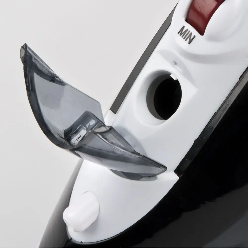Close-up angled view of the white G3 Ferrari Califfo G40017 steam iron, showing its smoky transparent water tank and black